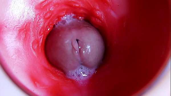 A huge cock inside a wet hole spews liquid and will soon fill with milk