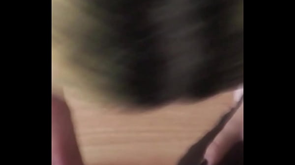 Glasses-wearing Aprill on her knees, desperately trying to swallow down my dick